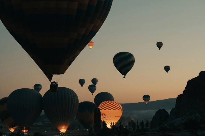 Enjoy a magical hot air balloonride over Cappadocia’s fairy chimneys at sunrise, book now for an unforgettable adventure in the skies of Turkey